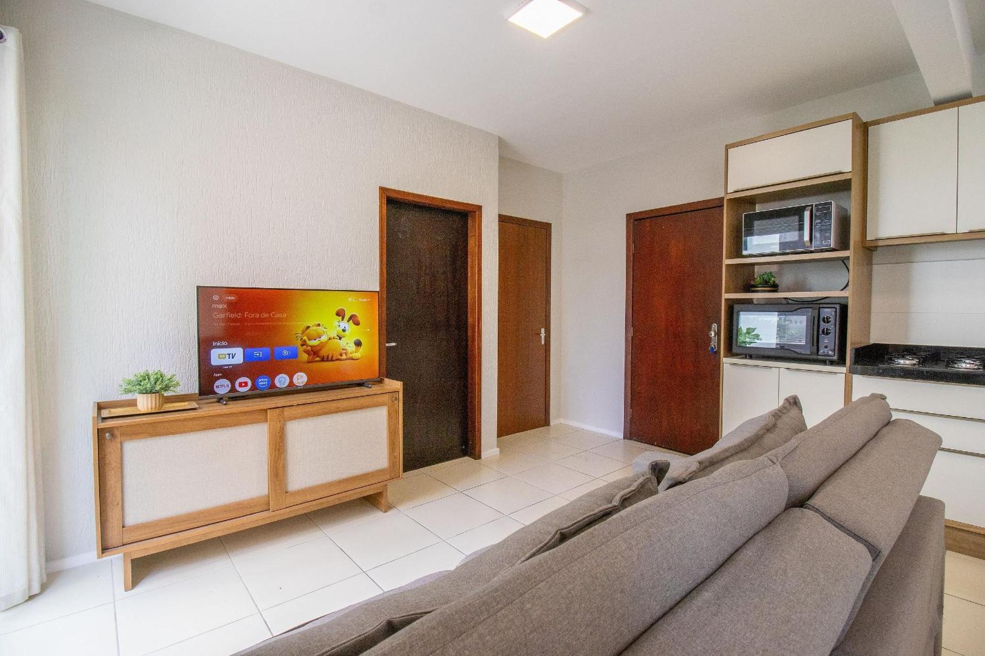 Apartamento Joa31 - 2 Dorm Climatizados, Garagem, Tv Smart